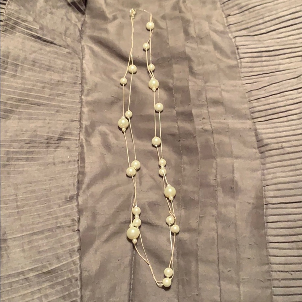 Double strand long pearl necklace